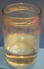 Warming up the jar for warm bottle method of expressing breast milk